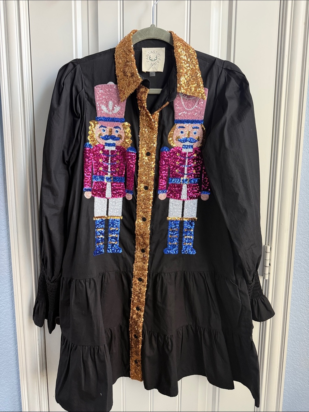 Fantastic Fawn Black Dress with Sequin Nutcracker Appliqués and Gold Trim